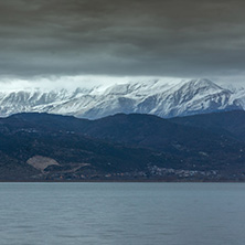 Amazing winter Landscape of Lake Pamvotida and Pindus mountain from city of Ioannina, Epirus, Greece