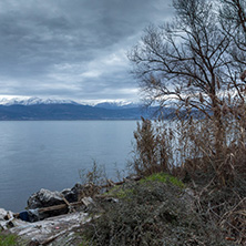 Amazing winter Landscape of Lake Pamvotida and Pindus mountain from city of Ioannina, Epirus, Greece