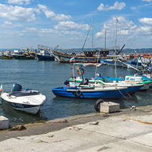 NESSEBAR, BULGARIA - AUGUST 12, 2018: Panorama with fishing boat at The Port of Nessebar, Burgas Region, Bulgaria