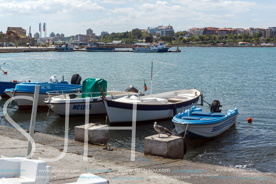 NESSEBAR, BULGARIA - AUGUST 12, 2018: Panorama with fishing boat at The Port of Nessebar, Burgas Region, Bulgaria