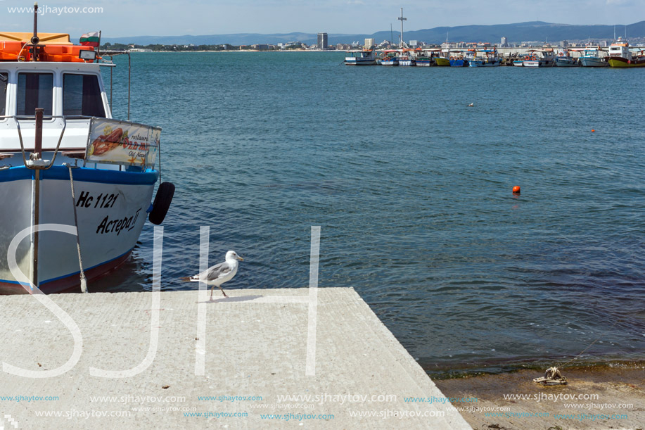 NESSEBAR, BULGARIA - AUGUST 12, 2018: Panorama with fishing boat at The Port of Nessebar, Burgas Region, Bulgaria