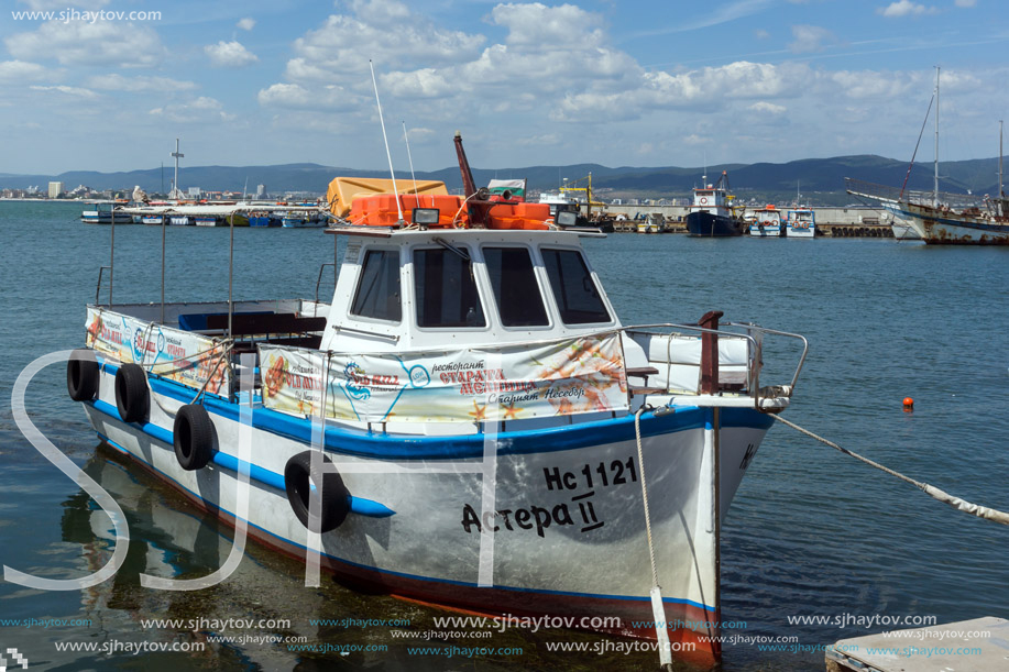 NESSEBAR, BULGARIA - AUGUST 12, 2018: Panorama with fishing boat at The Port of Nessebar, Burgas Region, Bulgaria