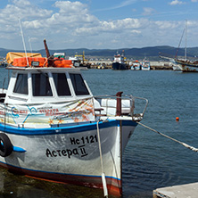 NESSEBAR, BULGARIA - AUGUST 12, 2018: Panorama with fishing boat at The Port of Nessebar, Burgas Region, Bulgaria