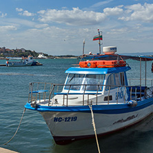 NESSEBAR, BULGARIA - AUGUST 12, 2018: Panorama with fishing boat at The Port of Nessebar, Burgas Region, Bulgaria