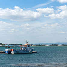 NESSEBAR, BULGARIA - AUGUST 12, 2018: Panorama with fishing boat at The Port of Nessebar, Burgas Region, Bulgaria