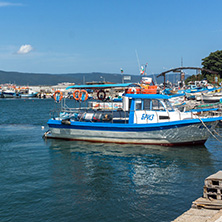 NESSEBAR, BULGARIA - AUGUST 12, 2018: Panorama with fishing boat at The Port of Nessebar, Burgas Region, Bulgaria