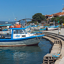 NESSEBAR, BULGARIA - AUGUST 12, 2018: Panorama with fishing boat at The Port of Nessebar, Burgas Region, Bulgaria