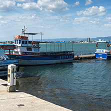 NESSEBAR, BULGARIA - AUGUST 12, 2018: Panorama with fishing boat at The Port of Nessebar, Burgas Region, Bulgaria