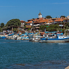 NESSEBAR, BULGARIA - AUGUST 12, 2018: Panorama with fishing boat at The Port of Nessebar, Burgas Region, Bulgaria