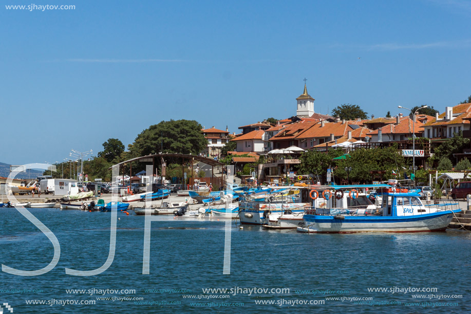 NESSEBAR, BULGARIA - AUGUST 12, 2018: Panorama with fishing boat at The Port of Nessebar, Burgas Region, Bulgaria