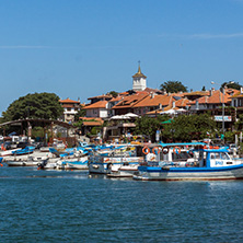 NESSEBAR, BULGARIA - AUGUST 12, 2018: Panorama with fishing boat at The Port of Nessebar, Burgas Region, Bulgaria