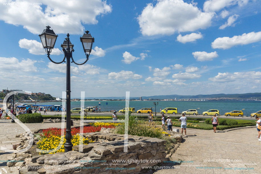 NESSEBAR, BULGARIA - AUGUST 12, 2018: Tourist visiting ruins of Ancient Fortifications at the entrance of old town of Nessebar, Burgas Region, Bulgaria