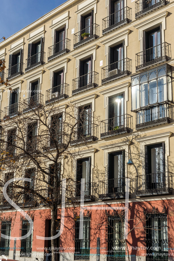 MADRID, SPAIN - JANUARY 24, 2018: Facade of typical Buildings and streets in City of Madrid, Spain