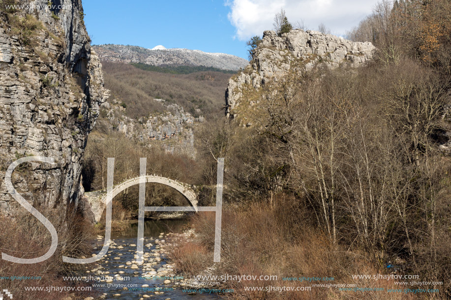 Landscape of Ancient Bridge of Kontodimos or Lazaridis in Vikos gorge and Pindus Mountains, Zagori, Epirus, Greece