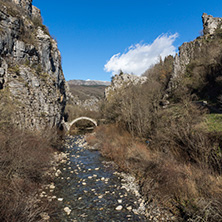 Landscape of Ancient Bridge of Kontodimos or Lazaridis in Vikos gorge and Pindus Mountains, Zagori, Epirus, Greece