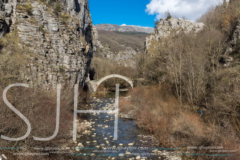 Landscape of Ancient Bridge of Kontodimos or Lazaridis in Vikos gorge and Pindus Mountains, Zagori, Epirus, Greece