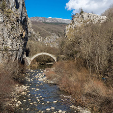 Landscape of Ancient Bridge of Kontodimos or Lazaridis in Vikos gorge and Pindus Mountains, Zagori, Epirus, Greece