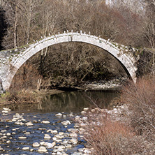 Landscape of Ancient Bridge of Kontodimos or Lazaridis in Vikos gorge and Pindus Mountains, Zagori, Epirus, Greece