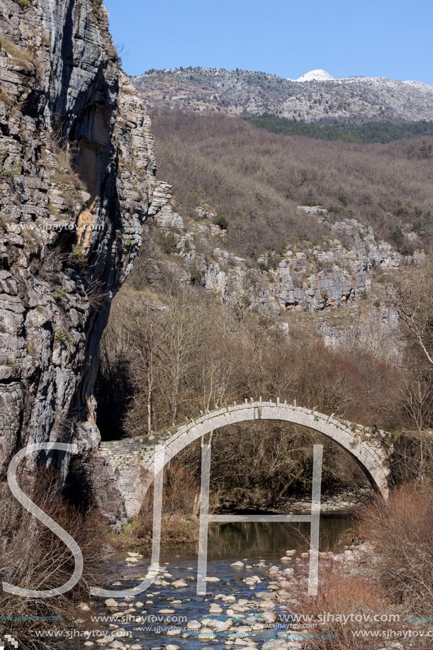 Landscape of Ancient Bridge of Kontodimos or Lazaridis in Vikos gorge and Pindus Mountains, Zagori, Epirus, Greece