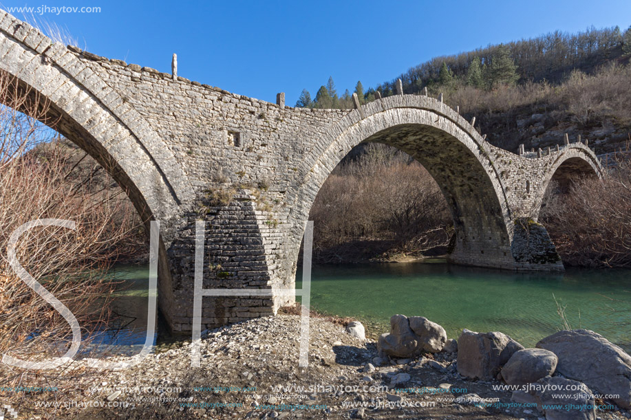 Landscape of Ancient Bridge of Missios in Vikos gorge and Pindus Mountains, Zagori, Epirus, Greece