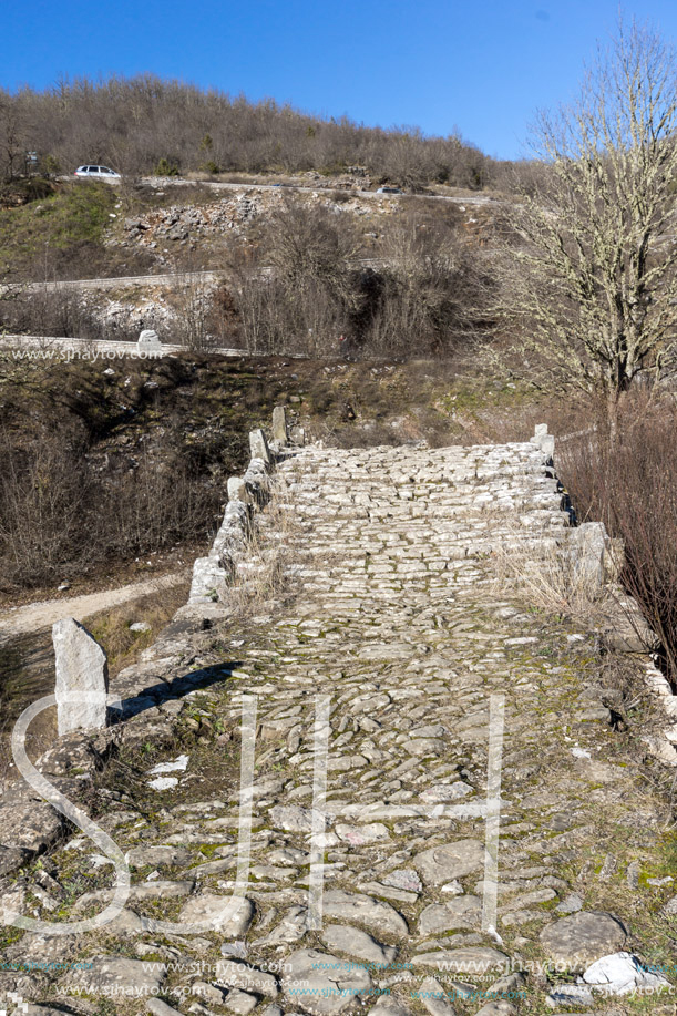 Landscape of Ancient Bridge of Missios in Vikos gorge and Pindus Mountains, Zagori, Epirus, Greece