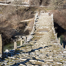 Landscape of Ancient Bridge of Missios in Vikos gorge and Pindus Mountains, Zagori, Epirus, Greece