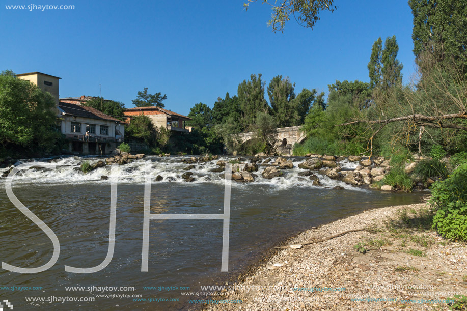 Summer view of Kadin most - a 15th-century stone arch bridge over the Struma River at Nevestino, Kyustendil Province, Bulgaria