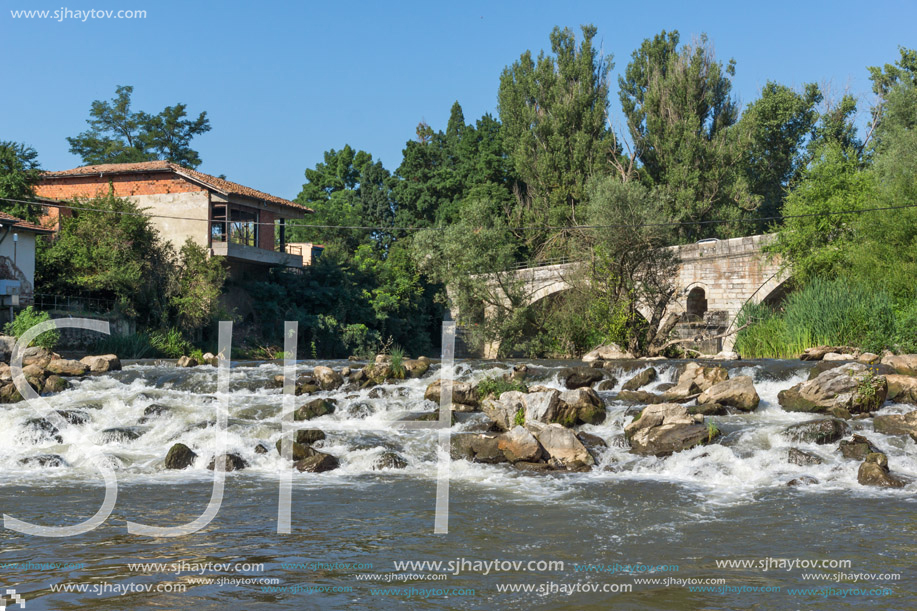 Summer view of Kadin most - a 15th-century stone arch bridge over the Struma River at Nevestino, Kyustendil Province, Bulgaria