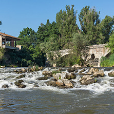 Summer view of Kadin most - a 15th-century stone arch bridge over the Struma River at Nevestino, Kyustendil Province, Bulgaria