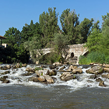 Summer view of Kadin most - a 15th-century stone arch bridge over the Struma River at Nevestino, Kyustendil Province, Bulgaria