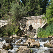 Summer view of Kadin most - a 15th-century stone arch bridge over the Struma River at Nevestino, Kyustendil Province, Bulgaria