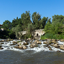 Summer view of Kadin most - a 15th-century stone arch bridge over the Struma River at Nevestino, Kyustendil Province, Bulgaria