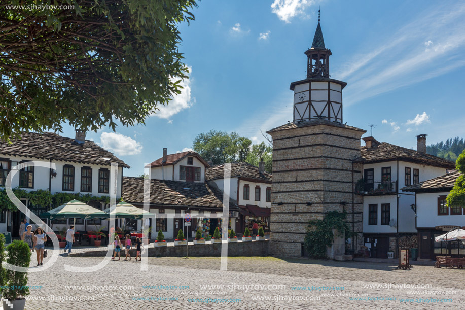 TRYAVNA, BULGARIA - JULY 6, 2018: Medieval clock Tower at the Center of historical town of Tryavna, Gabrovo region, Bulgaria