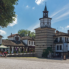 TRYAVNA, BULGARIA - JULY 6, 2018: Medieval clock Tower at the Center of historical town of Tryavna, Gabrovo region, Bulgaria