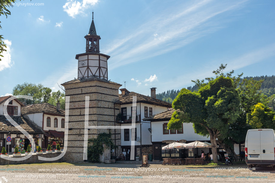 TRYAVNA, BULGARIA - JULY 6, 2018: Medieval clock Tower at the Center of historical town of Tryavna, Gabrovo region, Bulgaria