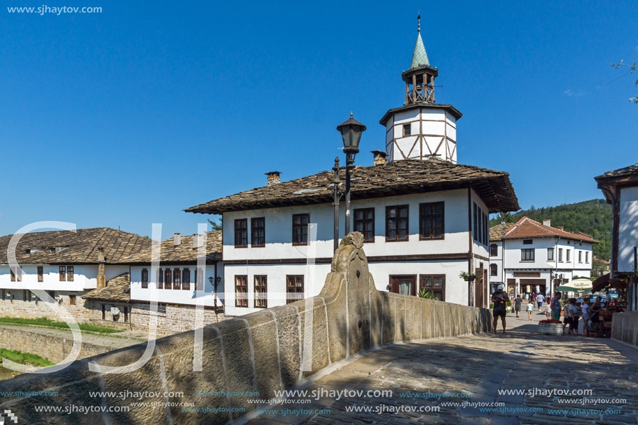 TRYAVNA, BULGARIA - JULY 6, 2018: Garbaviat (Humpback) Bridge and Medieval clock Tower at the Center of historical town of Tryavna, Gabrovo region, Bulgaria