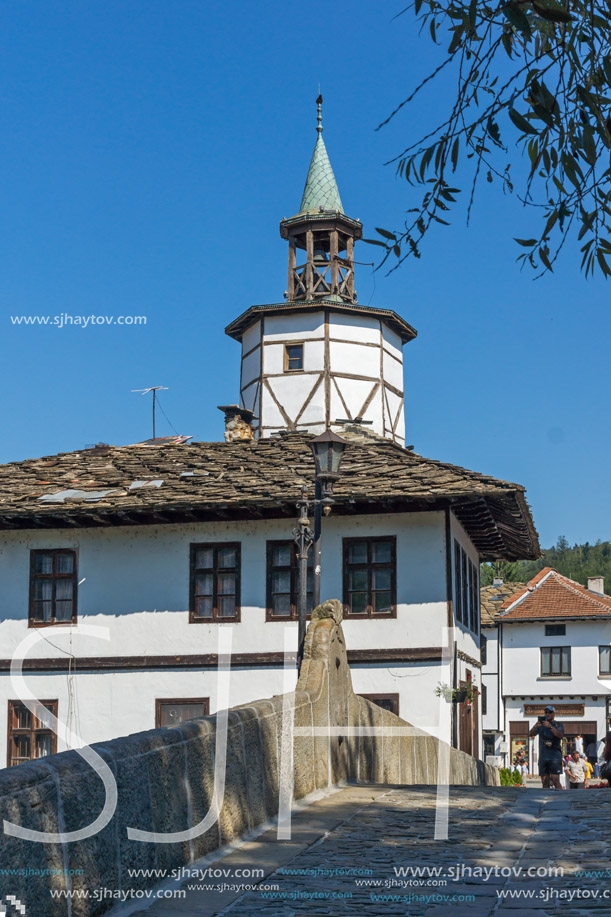 TRYAVNA, BULGARIA - JULY 6, 2018: Garbaviat (Humpback) Bridge and Medieval clock Tower at the Center of historical town of Tryavna, Gabrovo region, Bulgaria