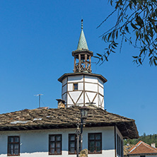 TRYAVNA, BULGARIA - JULY 6, 2018: Garbaviat (Humpback) Bridge and Medieval clock Tower at the Center of historical town of Tryavna, Gabrovo region, Bulgaria