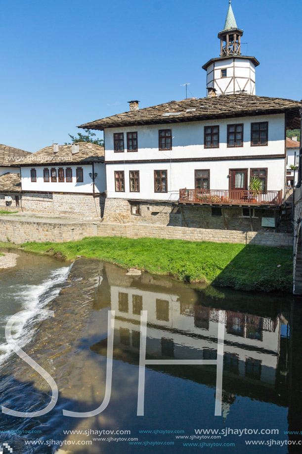 TRYAVNA, BULGARIA - JULY 6, 2018: Garbaviat (Humpback) Bridge and Medieval clock Tower at the Center of historical town of Tryavna, Gabrovo region, Bulgaria