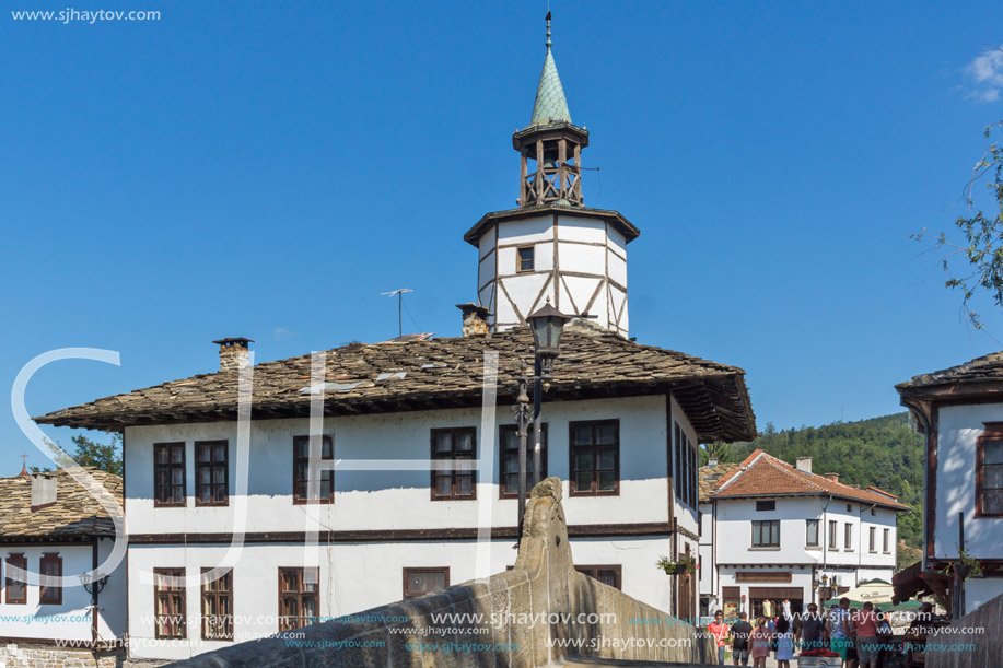 TRYAVNA, BULGARIA - JULY 6, 2018: Garbaviat (Humpback) Bridge and Medieval clock Tower at the Center of historical town of Tryavna, Gabrovo region, Bulgaria