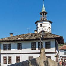 TRYAVNA, BULGARIA - JULY 6, 2018: Garbaviat (Humpback) Bridge and Medieval clock Tower at the Center of historical town of Tryavna, Gabrovo region, Bulgaria