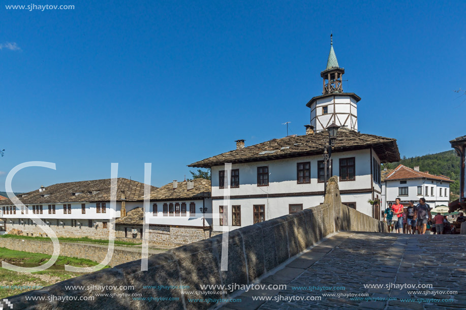 TRYAVNA, BULGARIA - JULY 6, 2018: Garbaviat (Humpback) Bridge and Medieval clock Tower at the Center of historical town of Tryavna, Gabrovo region, Bulgaria