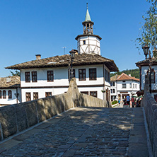 TRYAVNA, BULGARIA - JULY 6, 2018: Garbaviat (Humpback) Bridge and Medieval clock Tower at the Center of historical town of Tryavna, Gabrovo region, Bulgaria