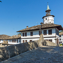 TRYAVNA, BULGARIA - JULY 6, 2018: Medieval clock Tower at the Center of historical town of Tryavna, Gabrovo region, Bulgaria