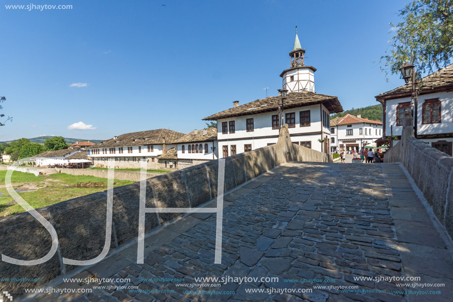 TRYAVNA, BULGARIA - JULY 6, 2018: Garbaviat (Humpback) Bridge and Medieval clock Tower at the Center of historical town of Tryavna, Gabrovo region, Bulgaria