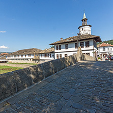 TRYAVNA, BULGARIA - JULY 6, 2018: Garbaviat (Humpback) Bridge and Medieval clock Tower at the Center of historical town of Tryavna, Gabrovo region, Bulgaria