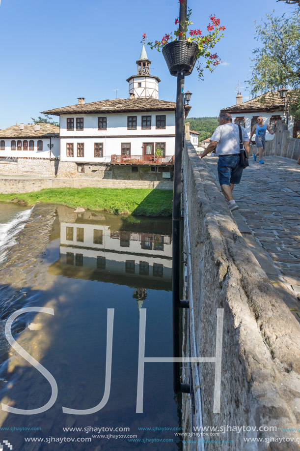 TRYAVNA, BULGARIA - JULY 6, 2018: Garbaviat (Humpback) Bridge and Medieval clock Tower at the Center of historical town of Tryavna, Gabrovo region, Bulgaria