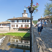 TRYAVNA, BULGARIA - JULY 6, 2018: Garbaviat (Humpback) Bridge and Medieval clock Tower at the Center of historical town of Tryavna, Gabrovo region, Bulgaria