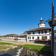 TRYAVNA, BULGARIA - JULY 6, 2018: Garbaviat (Humpback) Bridge and Medieval clock Tower at the Center of historical town of Tryavna, Gabrovo region, Bulgaria