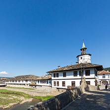 TRYAVNA, BULGARIA - JULY 6, 2018: Garbaviat (Humpback) Bridge and Medieval clock Tower at the Center of historical town of Tryavna, Gabrovo region, Bulgaria